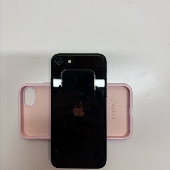 Black Smartphone with Pink Case